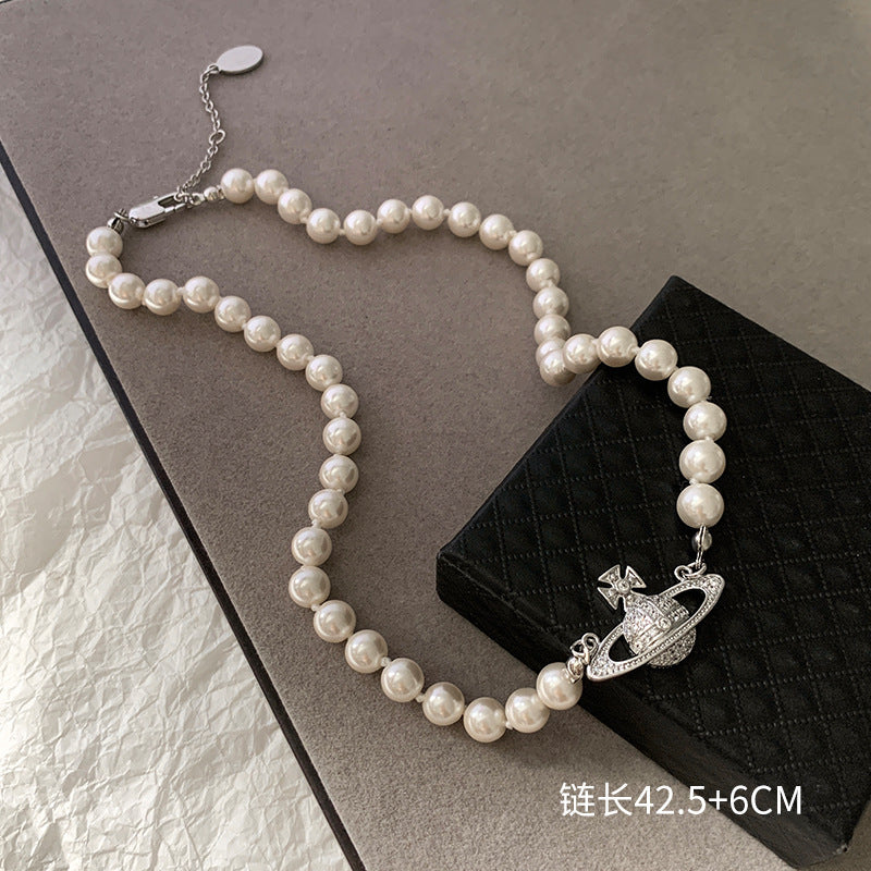 Pearl Saturn Bracelet and Necklace Set