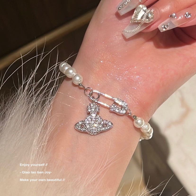 Pearl Saturn Bracelet and Necklace Set