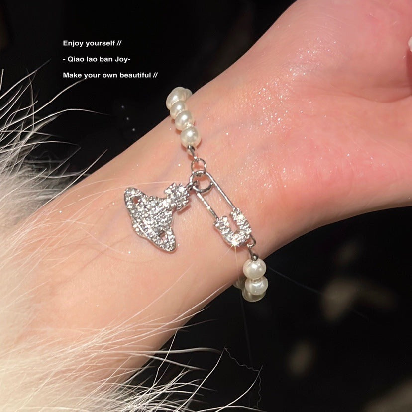 Pearl Saturn Bracelet and Necklace Set