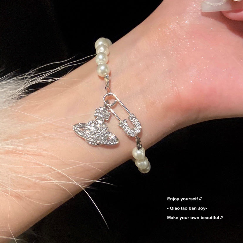 Pearl Saturn Bracelet and Necklace Set